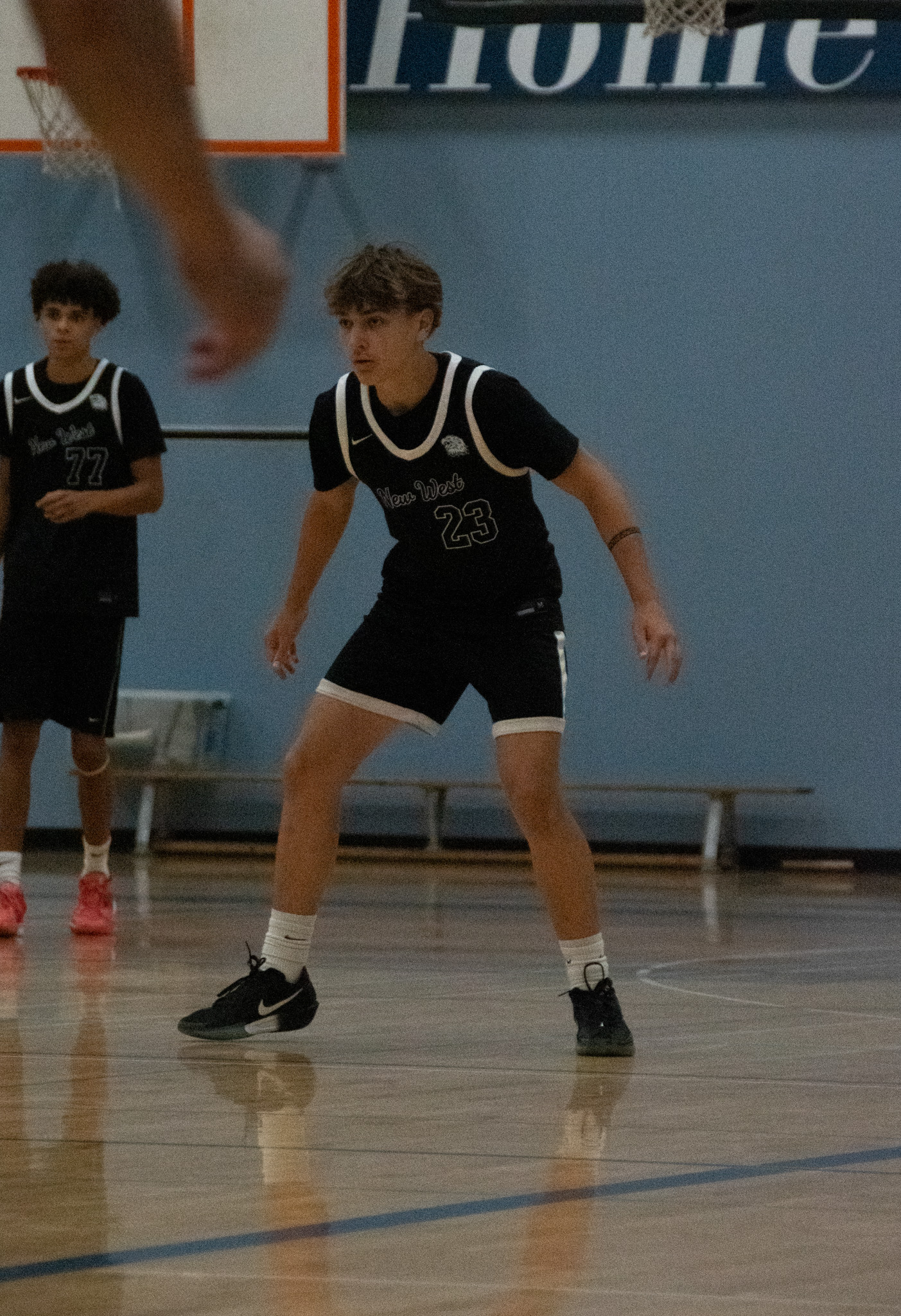 A New West Eagles player locked in on defense during a game